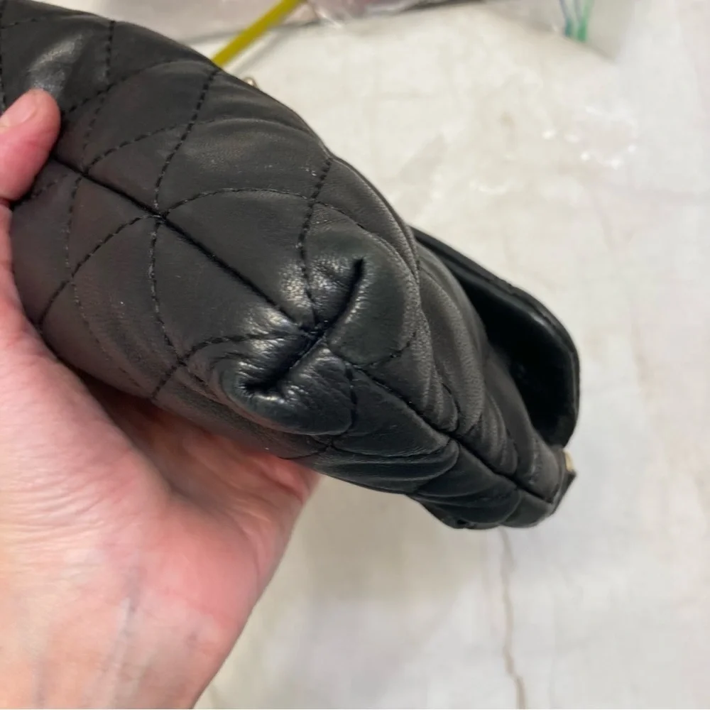Calvin Klein quilted black leather clutch bag